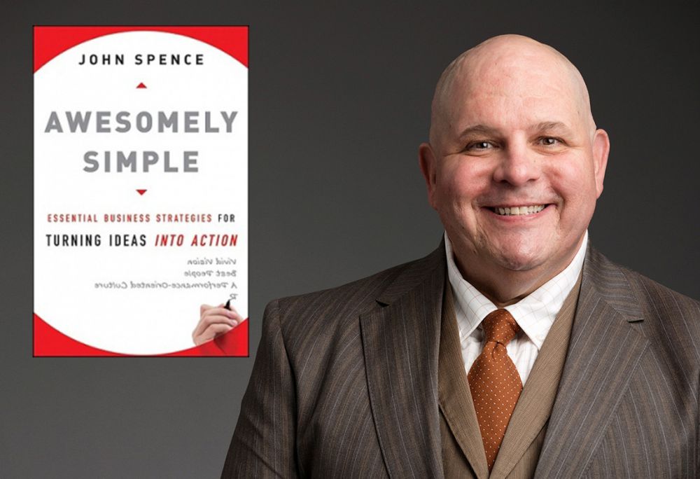 John Spence with Book - BLOG
